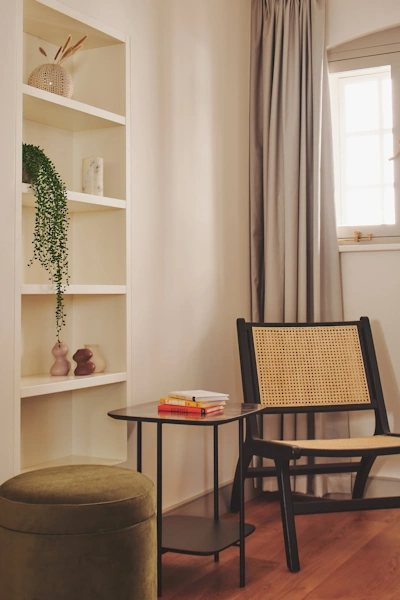 Sleek modern glass extension seamlessly blending with historic red brick architecture creating perfect harmony between old and new design