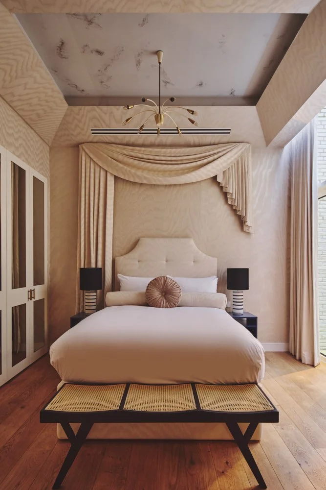 Tranquil private courtyard garden oasis with lush green plants contemporary seating and natural stone pathways offering peaceful retreat in heart of London